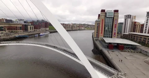 Closeup aerial of Spectacular Gateshead Millenium Bridge arch Stock Footage 159141027