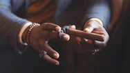 Closeup Of African American Manly Hands Cutting Precious Cigar Stock Footage