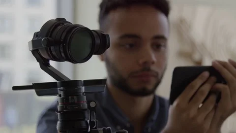 Closeup African American Tech Worker Controlling Automated Robotic Camera Arm In Видео 82548903