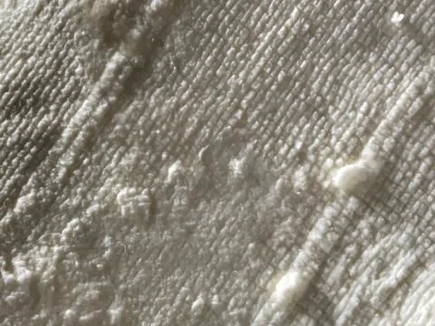 Closeup of aged white cheese texture Stock Photos