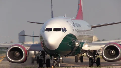 Closeup, Air Bucharest, Boeing 737 Taxiing at Bologna "G.Marconi" Airport, Italy Stock Footage 94226573