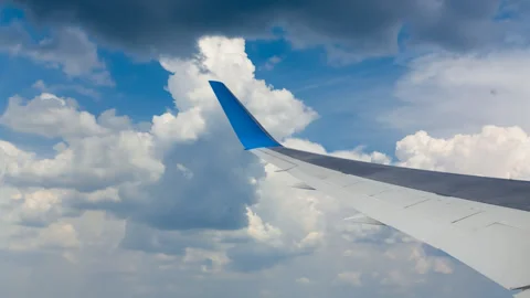 Closeup airplane wing fly through the dense clouds Vídeos de archivo 150683358