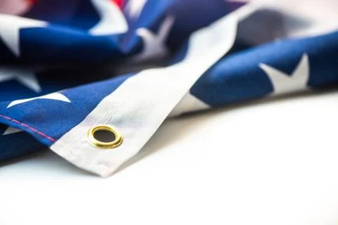 Closeup of American flag on plain background 库存照片
