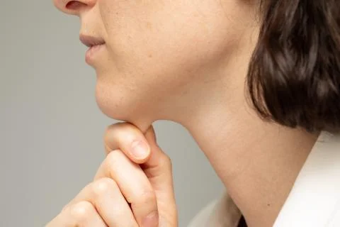 A closeup and side profile view of a thirty something Caucasian girl, of slim 스톡 사진