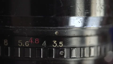 Closeup of aperture being changed on a lens Stock Footage 136951163