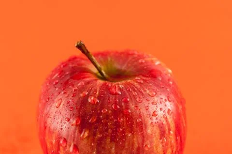Closeup apple red dew drops Stock Photos