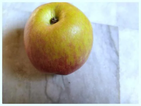 Closeup of apple, white background Stock Photos