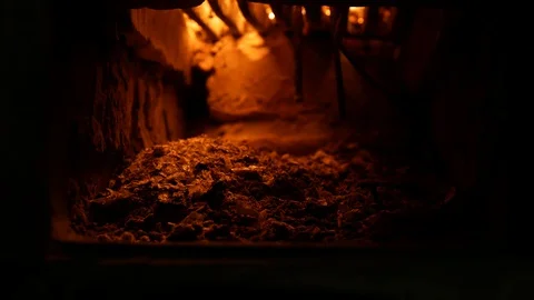 Closeup of ash in an air intake old burning stove Stock Footage 128399569