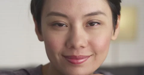 Closeup of Asian woman's face 库存影片 42591276