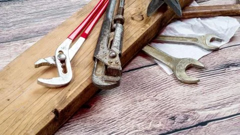 Closeup of assorted work tools on wood Stock Photos