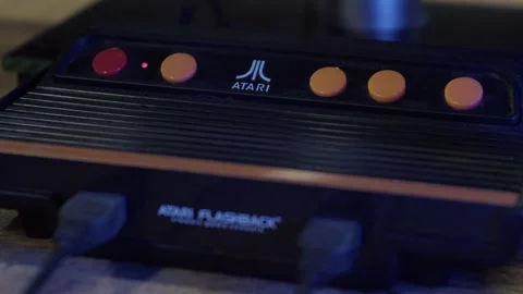 Closeup Of Atari Flashback Classic Game Console - Retro Design With Orange Vídeo Stock 311682187