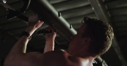 Closeup of athletic man doing chin-ups Stock Footage 83188816