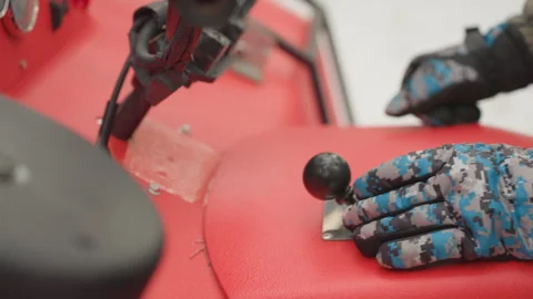 Closeup of ATV gear shift action. Mechanic handles ATV gear with camouflage Stock Footage 334784468