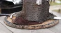 Closeup of authentic steel plate helmet with mail face mask, historic exhibition HD Footage