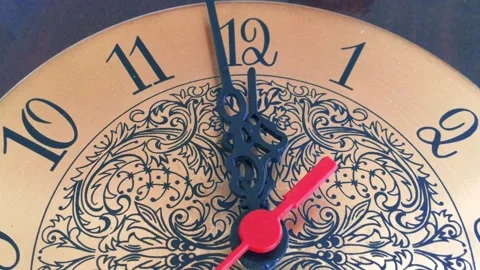 Closeup of authentic vintage Clock in timelapse in daytime on dark grey surface. Stock Footage 142229039
