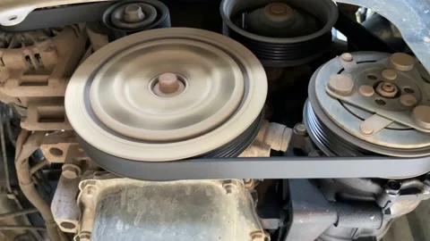 Closeup auto running engine on lift at service station. Video stock 159015820