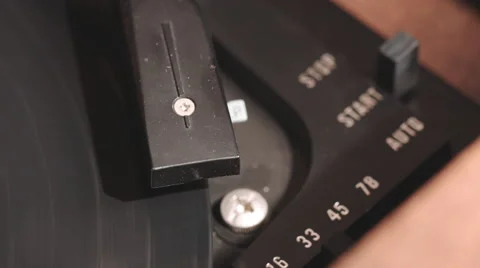 Closeup Auto Start Record Player Needle and Vinyl Stock Footage 61709445