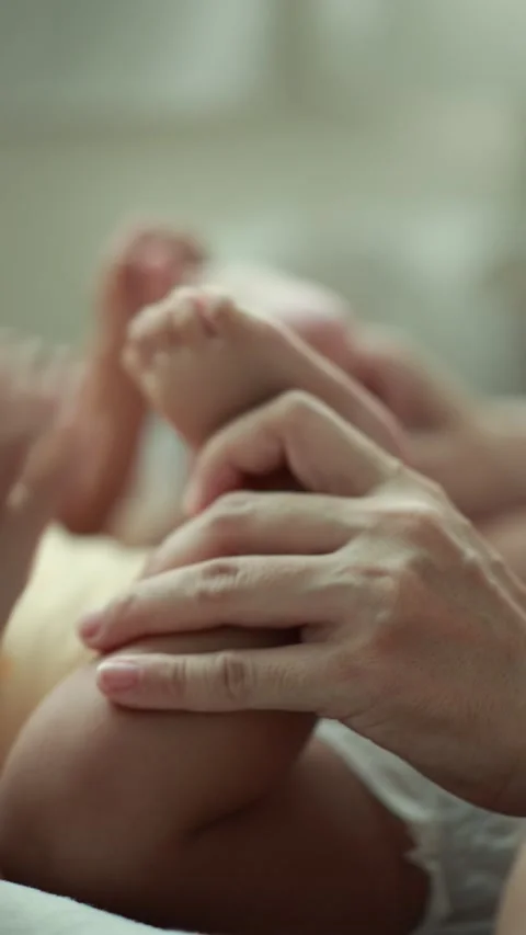 Closeup of a baby boy on the bed Stock Footage 333889391