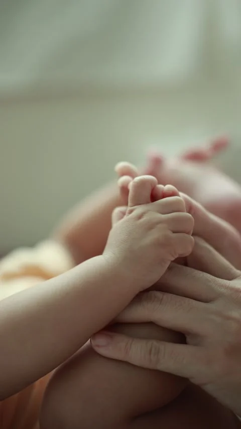 Closeup of a baby boy on the bed Stock Footage 333889450