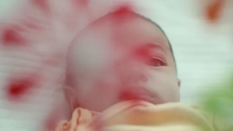 Closeup of a baby boy on the bed Stock Footage 333889538