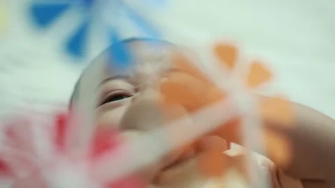 Closeup of a baby boy on the bed Stock Footage 333889559