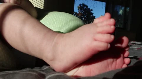 Closeup of baby's barefeet Video stock 58883029