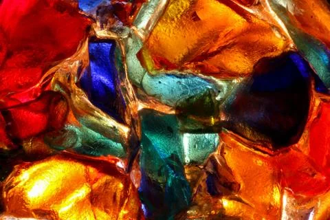 Closeup of back lit stained abstract glass pattern Stock Photos