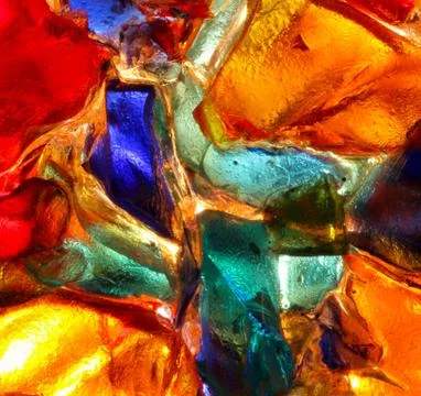 Closeup of back lit stained abstract glass pattern Stock Photos