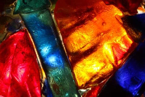 Closeup of back lit stained abstract glass pattern Stock Photos