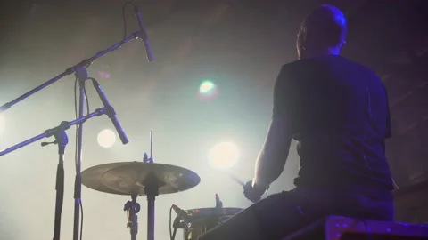 Closeup back view the drummer plays rock on music festival. Footage. View from Stock-Footage 142741353
