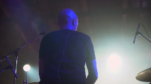 Closeup back view the drummer plays rock on music festival. Footage. View from Video stock 142834016