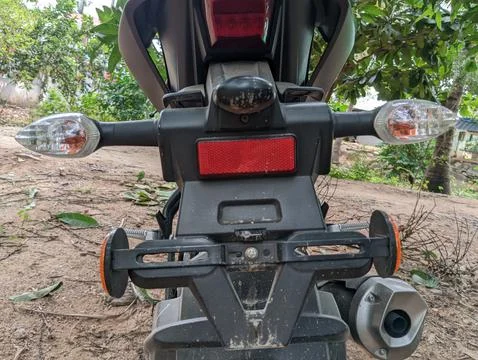 Closeup Back view of a motorcycle or motorbike with sidelight Stock Photos