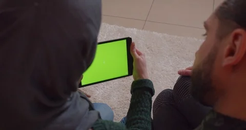 Closeup back view shoot of young cheerful muslim couple in a newly bought Stock Footage 106837381