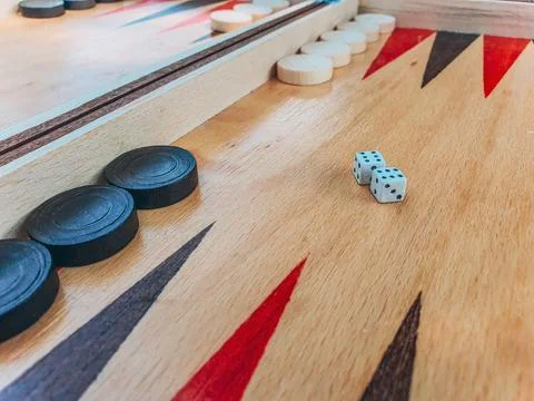 Closeup of a backgammon board with dice Stock Photos