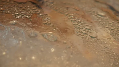Closeup background of sweaty glass cap of the pan with boiling meat inside in 動画素材 112747285