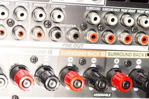 Closeup of the backside of an AV receiver Stock Photos
