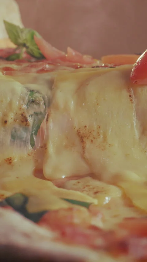 Closeup, baked and slice of pizza for takeaway, melted cheese and Italian recipe Stock Footage 340539935