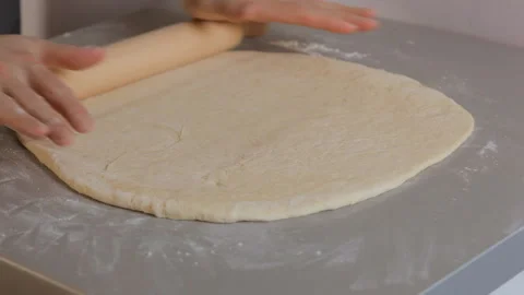 Closeup. Baker knead flour dough, roll it with a rolling pinю Baking concept. Video stock 101139935