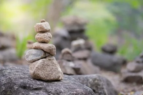 Closeup of balancing rock stack pyramid for mediation and harmony concept. Stock Photos