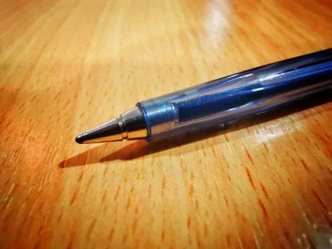 Closeup of a ball pen nib pointer ball blue ball pen tip Stock Photos