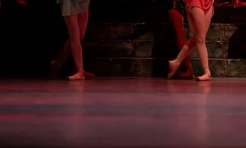 Closeup of ballerinas dancing on stage. Stock Photos