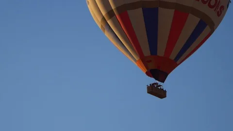 Closeup of a balloon in the blue sky. People fly on balloons. Stock Footage 105123749