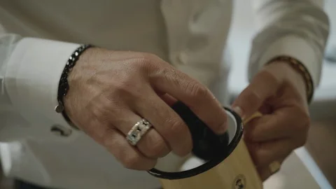 Closeup of barber making shaving foam in a mug. Video stock 117682874