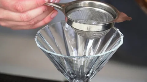 Closeup of barman making a fruit cocktail Stock Footage 77026127