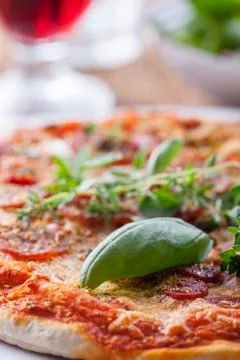 Closeup of basil on pizza Stock Photos