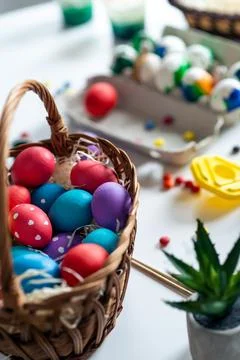 Closeup of basket with Easter eggs. Stock Photos