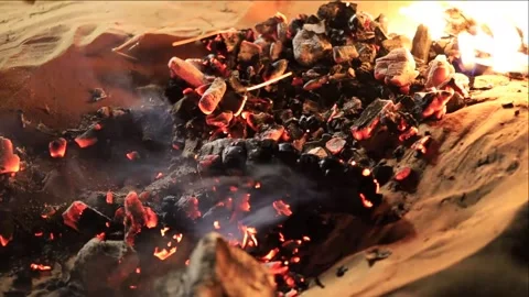Closeup of BBQ fire in desert Stock Footage 141801897