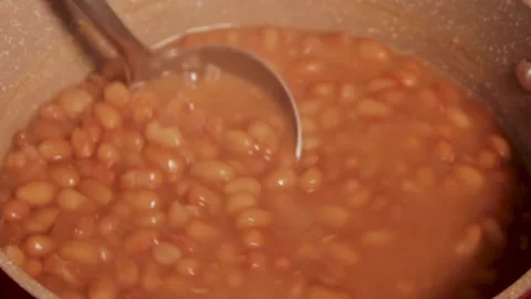 CLOSEUP OF BEAN PREPARATION AND SHOWING TO THE CAMERA. Video stock 133897889