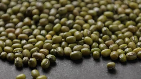 Closeup of beans on wooden table Stock Footage 286781057