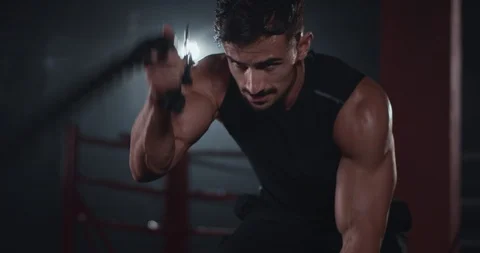 Closeup beautiful athletic guy have a hard workout training practicing cross Video stock 116769310